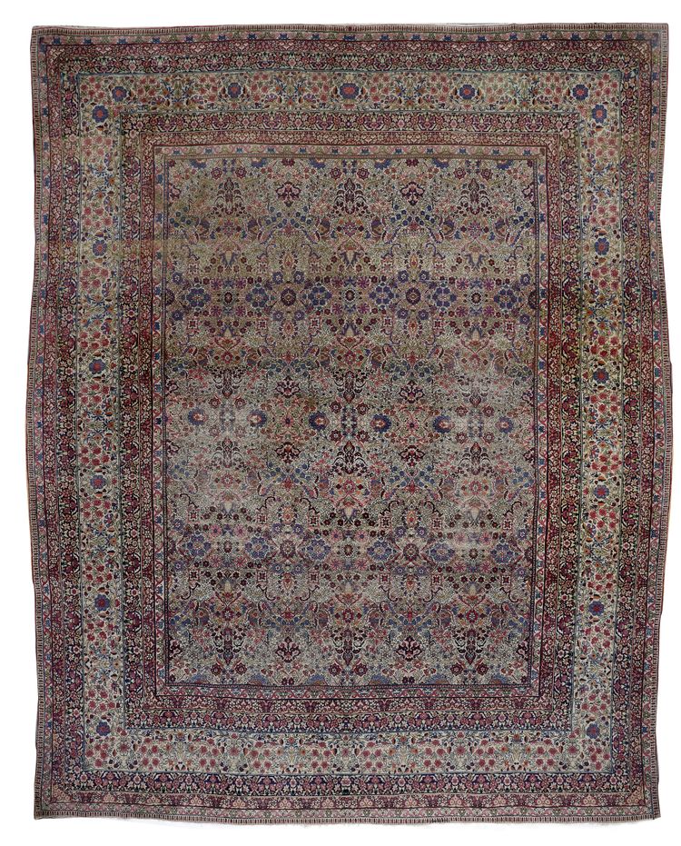 A KIRMAN RAWER CARPET