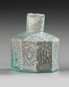 A MOLDED HEXAGONAL GLASS BOTTLE, 7TH–9TH CENTURY