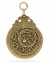 A BRASS ASTROLOBE SIGNED BY MUHAMMAD MUQIM IBN 'ISA IBN AL-HADDAD, LAHORE, DATED 1051 AH/1641-42 AD