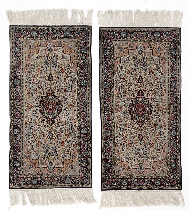 A PAIR OF SILK GHOM RUGS