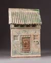 A Chinese green-glazed pottery store house