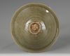A Yaozhou celadon-glazed ‘chrysanthemum scroll’ bowl