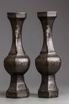 A pair of Chinese bronze hexagonal vases