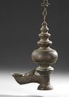AN INDIAN TEMPLE BRONZE OIL LAMP,  DECCAN OR SOUTH INDIA, 16TH/17TH CENTURY