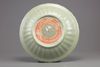 A LARGE CHINESE CELADON GLAZED DISH, MING DYNASTY (1368-1644) OR LATER
