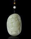 A CHINESE JADE CARVED PENDANT, 20TH CENTURY