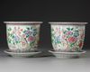 A PAIR OF CHINESE FAMILLE ROSE POTS ON STANDS, 19TH-20TH CENTURY