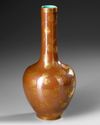 A CHINESE BROWN-GROUND GILT-DECORATED BOTTLE VASE, QING DYNASTY (1644-1911)