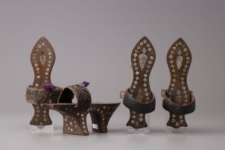 Two pairs of mother-of-pearl inlaid wooden hammam shoes