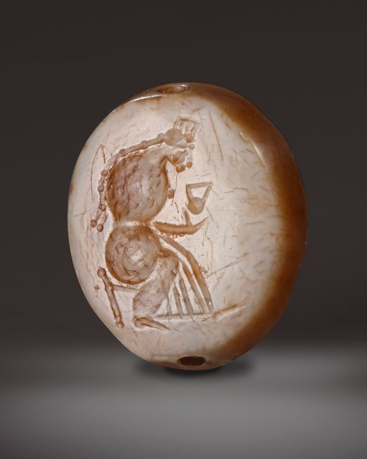 A GRECO PERSIAN AGATE SCARABOID STAMP SEAL, CIRCA LATE 4TH-EARLY 3RD CENTURY B.C.