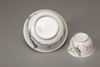 An en grisaille 'pheasant' tea cup and bowl