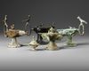 SIX PERSIAN BRONZE OIL LAMPS, SELJUK 12TH-13TH CENTURY AND LATER