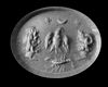 A ROMAN CARNELIAN INTAGLIO SHOWING AN EAGLE, SCORPION, ZEUS AMMON AND SERAPIS, 1ST-2ND CENTURY AD