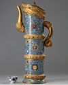 A LARGE CHINESE TIBETAN-STYLE CLOISONNÉ ENAMEL 'MONK'S CAP' EWER, DUOMOHU, CHINA, QING DYNASTY (1644-1911)