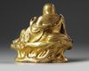 A gilt bronze figure of budai