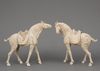 A PAIR OF LARGE CHINESE POTTERY TANG HORSES