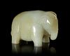 A GREYISH-WHITE JADE ELEPHANT, CHINA, HAN DYNASTY (206 BC-220 AD)