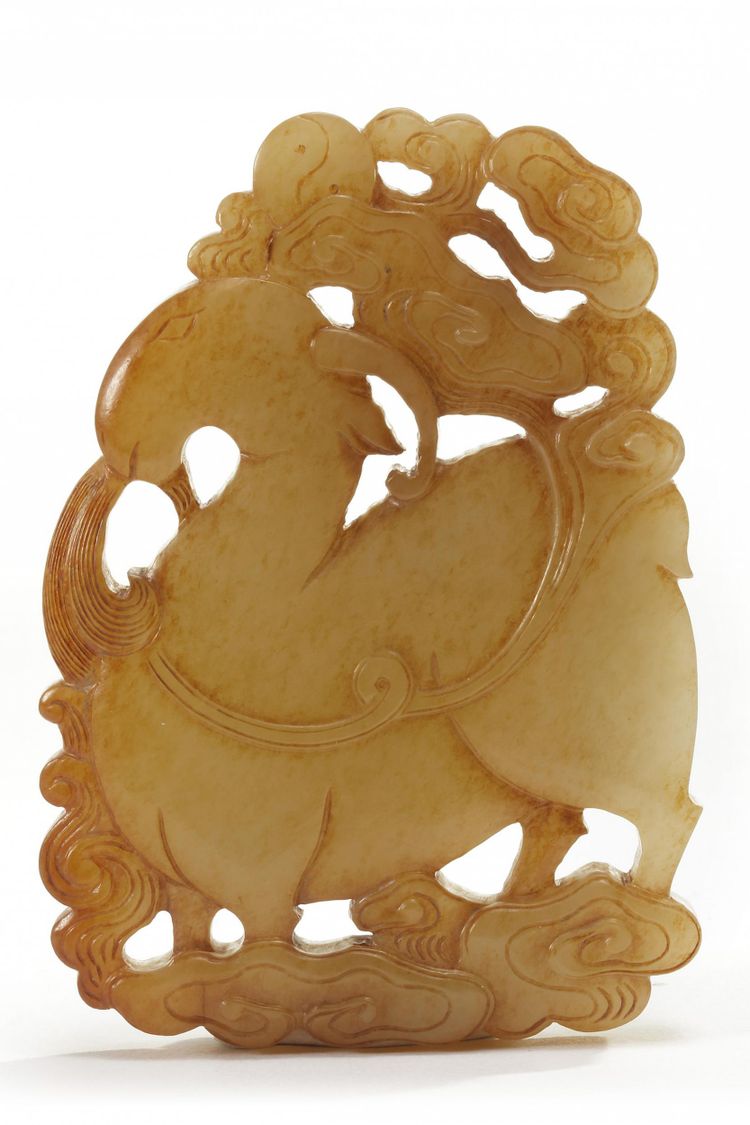 A Chinese celadon jade 'ram' plaque