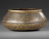 A PERSIAN SILVER INLAID BRASS BASIN, ILKHANID 14TH CENTURY
