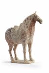A Chinese painted pottery figure of a horse
