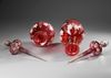PAIR OF ANTIQUE RUBY RED GLASS DECANTERS, 19TH CENTURY