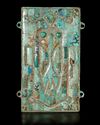 A TURQUOISE-INLAID PENDANT, SHANG DYNASTY