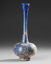 A COBALT-BLUE GLASS SPRINKLER FLASK, 9TH–11TH CENTURY