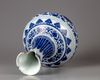 A blue and white bottle vase
