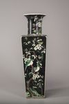 A famille noir square-section vase