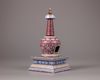 A Chinese ruby red-ground famille rose stupa