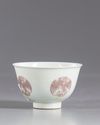 A small Chinese iron-red phoenix bowl