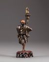 A bronze figure of a samurai