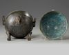 A Chinese bronze tripod ding and cover