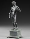 A ROMAN BRONZE STATUETTE OF APOLLO CARNEUS, CIRCA 1ST-2ND CENTURY A.D.