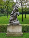 A CAST-IRON GROUP REPRESENTING EROS SEATED ON A PANTHER IN THE MANNER OF GIOVANNI MARIA BENZONI, 19TH CENTURY, STAMPED A53 MANNER OF GIOVANNI MARIA BENZONI (ITALIAN 1809-1873)