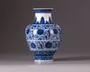 A small blue and white vase
