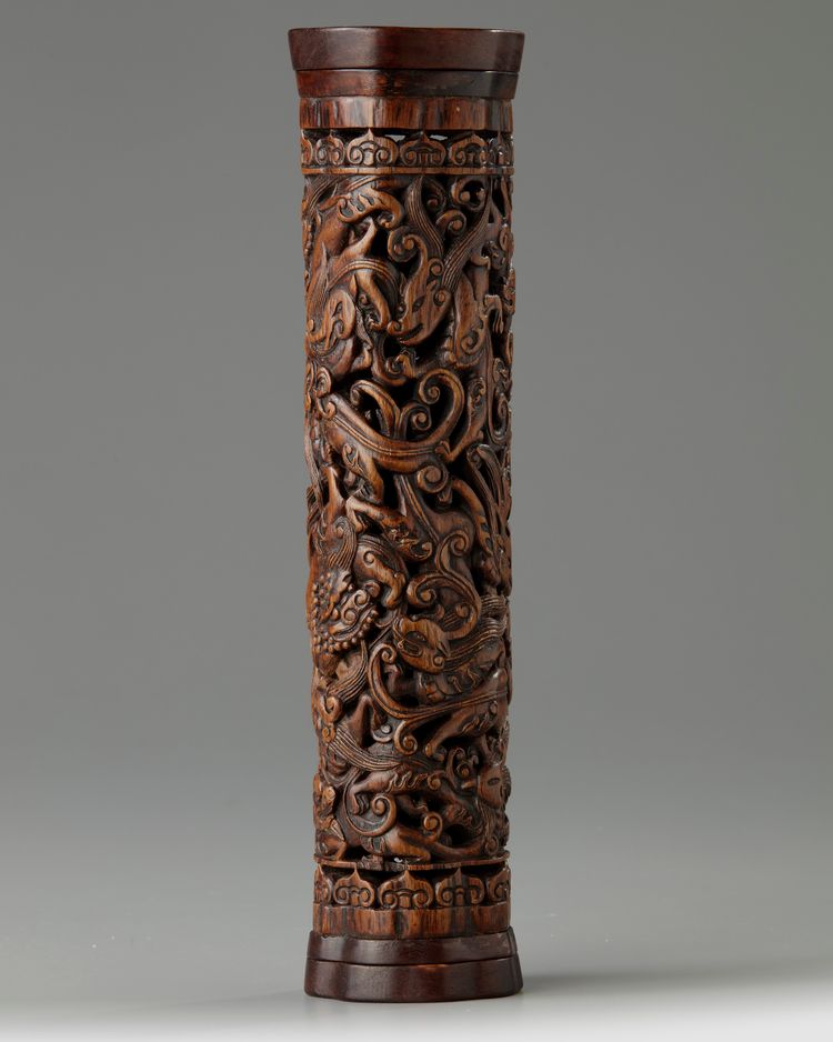 A Chinese aloeswood and wood-mounted incense holder