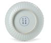 A CHINESE CARVED WHITE GLAZED 'LOTUS' DISH