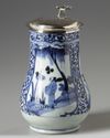 A JAPANESE BLUE AND WHITE JUG WITH SILVER COVER, 17TH CENTURY