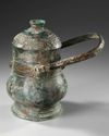 A CHINESE BRONZE RITUAL WINE VESSEL AND COVER, HAN DYNASTY OR LATER