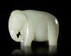 A GREYISH-WHITE JADE ELEPHANT, CHINA, HAN DYNASTY (206 BC-220 AD)