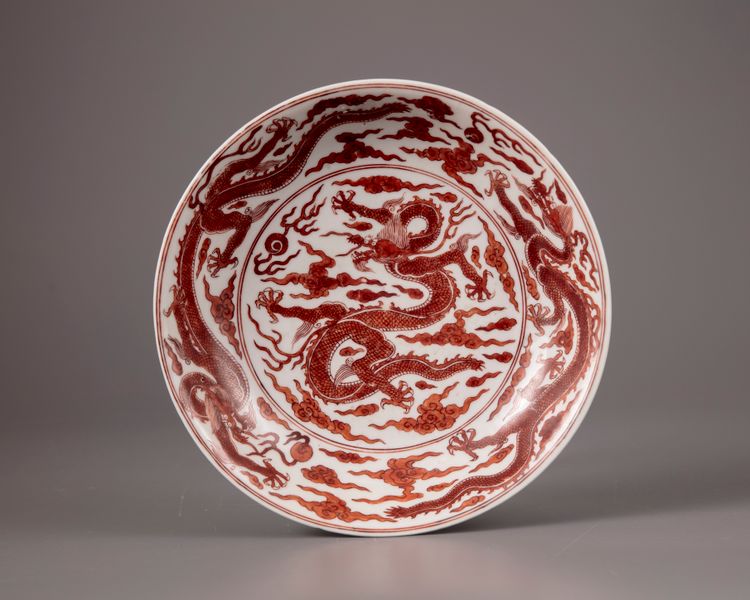 A Chinese iron-red-decorated 'dragon' dish