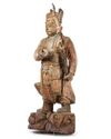 A CHINESE PAINTED AND LACQUERED WOOD FIGURE OF A GUARDIAN, LATE MING DYNASTY (1368-1644)