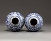 A pair of Chinese blue and white floral vases