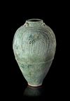 A LARGE UMAYYAD TURQUOISE-GREEN GLAZED JAR, MESOPOTAMIA, 7TH-8TH CENTURY