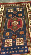 AN EARLY ANATOLIAN KAGIZMAN RUG, 18TH CENTURY