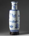A large Chinese blue and white 'precious objects' rouleau vase