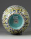 A Chinese yellow ground fmille rose ‘flowers of the four seasons’ vase