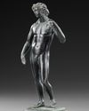 A ROMAN BRONZE STATUETTE OF APOLLO CARNEUS, CIRCA 1ST-2ND CENTURY A.D.