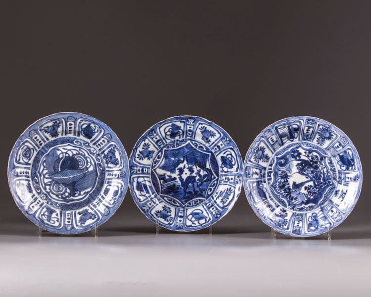 Three blue and white plates